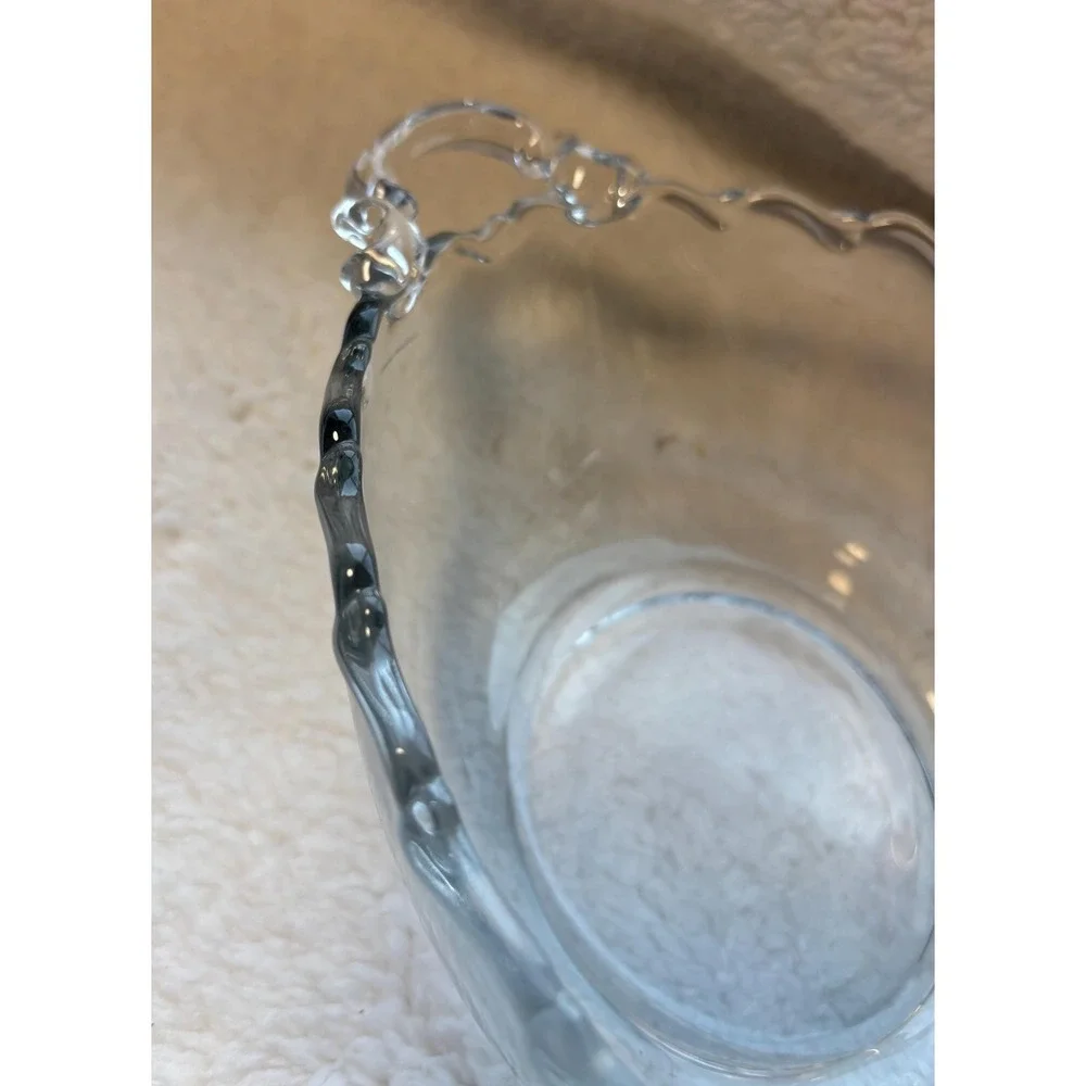 vintage clear glass item is a handled bowl from the Century pattern, mfct by